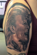 David Bowie black and grey portrait tattoo